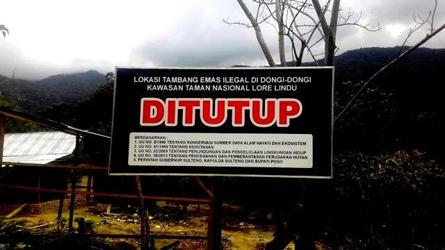 Plang yang terpasang di lokasi Dongi-Dongi sebelum penertiban bulan Maret 2016 yang berbuntut rusuh. Foto: Ahmar