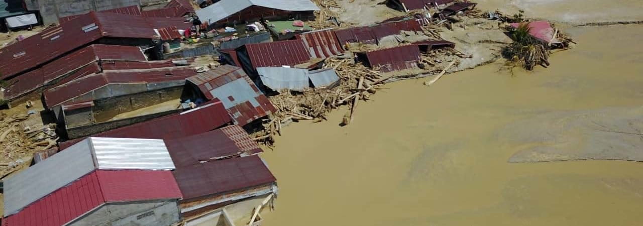 Pemukiman penduduk yang terendam banjir di Luwu Utara. Foto: BNPB