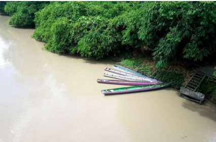 Sungai Seturan, dengan air keruh, yang mengalir ke Sungai Malinau. Foto: Jatam